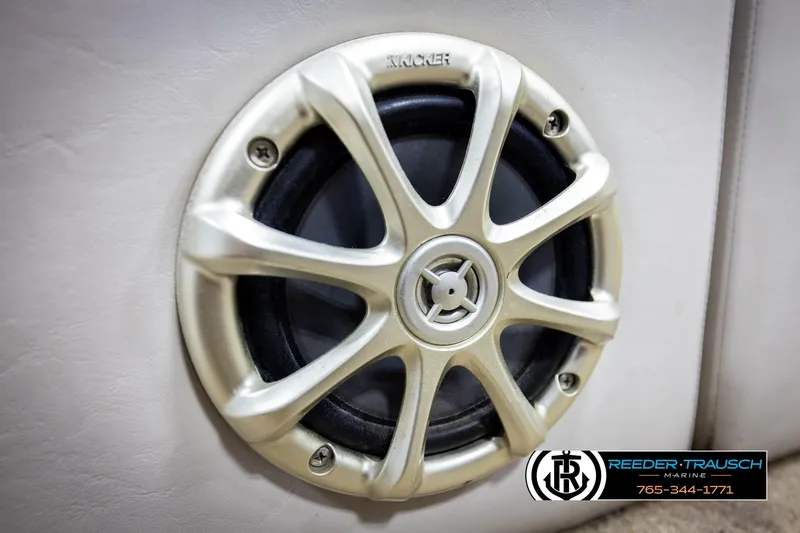 Slide: The Image of Speaker on a 2013 Bennington 2375 GCW boat, featuring a stylish silver grille. - 43