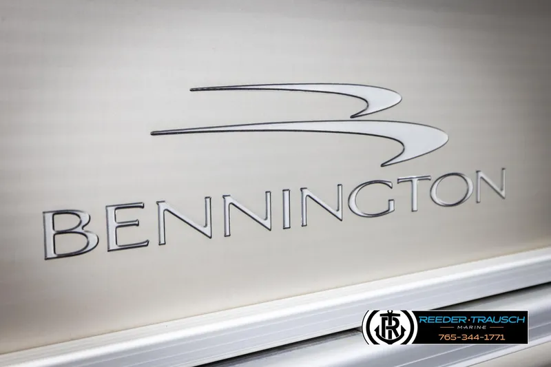 Slide: The Image of 2013 Bennington 2375 GCW logo on boat exterior, Reeder-Trausch Marine branding visible. - 48