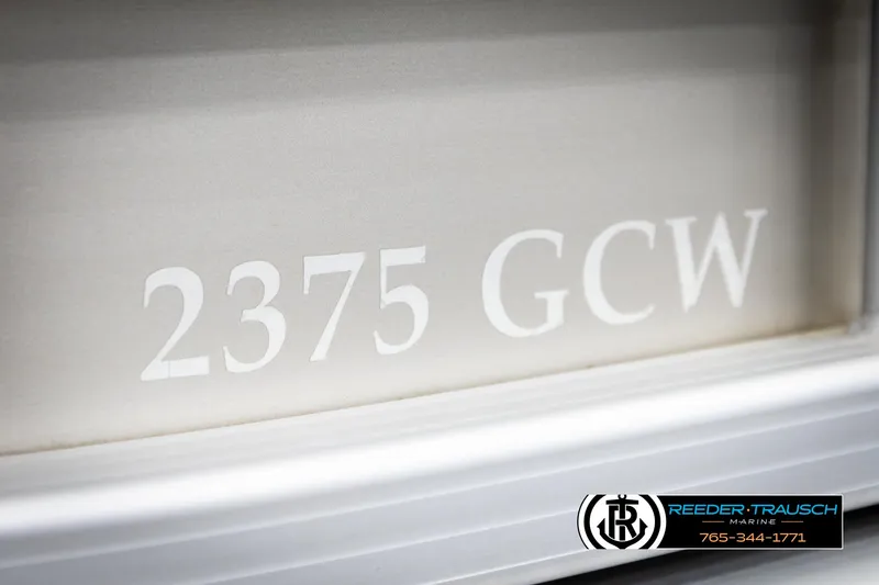 Slide: The Image of Close-up of 2013 Bennington 2375 GCW model lettering on boat exterior. - 49