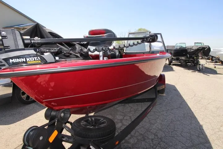Slide: The Image of 2025 Vexus ADX180LS boat with Minn Kota Terrova motor on trailer. - 1