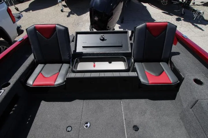 Slide: The Image of 2025 Vexus ADX180LS boat interior with dual seats and storage compartment. - 6