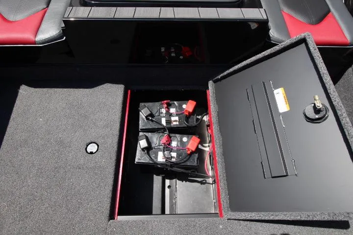 Slide: The Image of Open battery compartment of 2025 Vexus ADX180LS boat, showcasing dual batteries. - 7