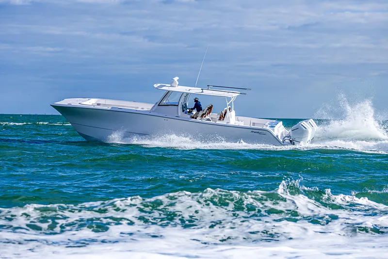 Slide: The Image of 2026 Front Runner 43 Catamaran cruising on ocean waves. - 1