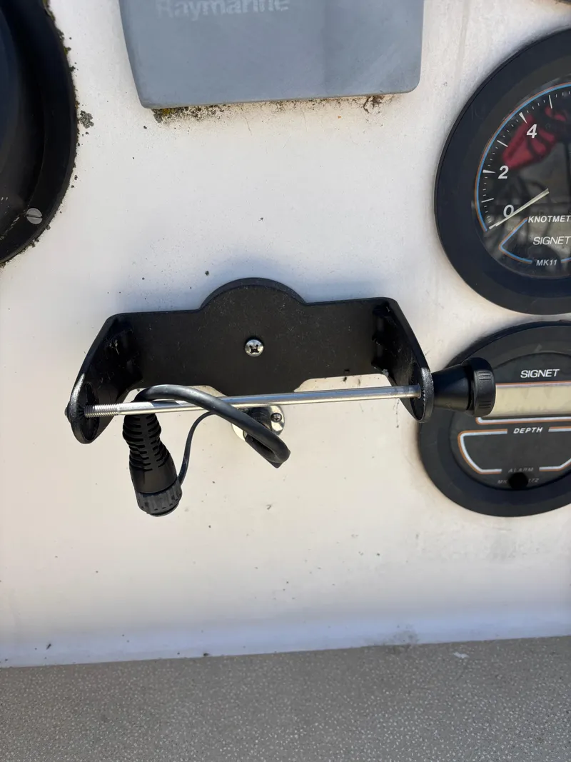Slide: The Image of Boat dashboard with Raymarine equipment and Signet gauges on a 1972 Tartan 34C. - 21