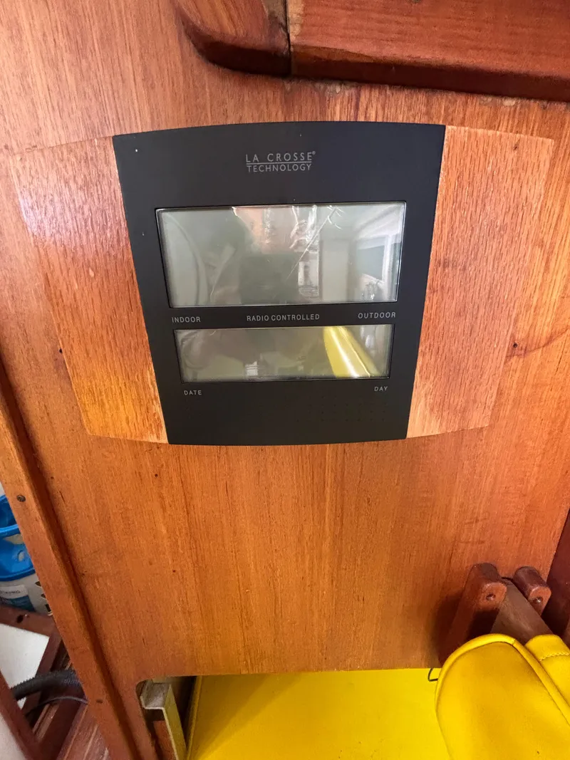 Slide: The Image of La Crosse Technology display on 1972 Tartan 34C wooden interior panel. - 28