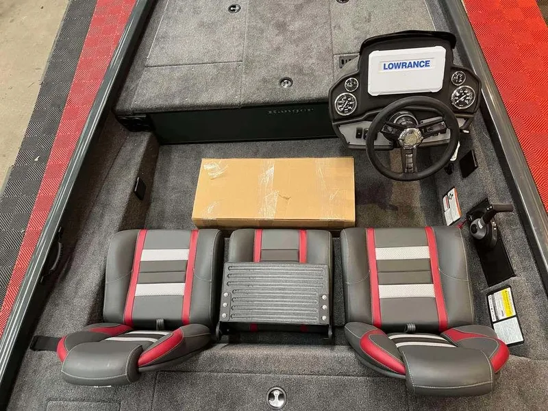 Slide: The Image of 2025 Ranger RT188C boat interior with Lowrance system and seating. - 6