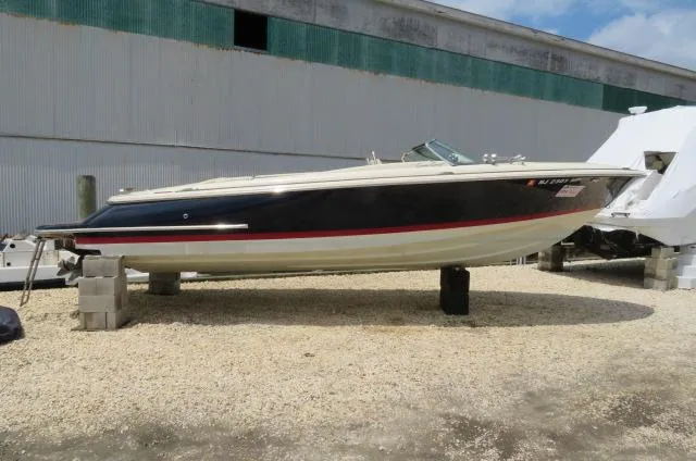 The Image of 2021 Chris-Craft Launch 27 boat on dry dock, side view, outdoors. - 0