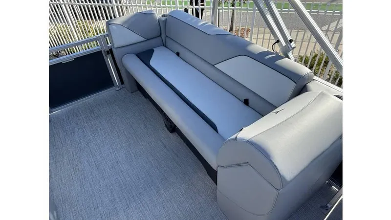 Slide: The Image of 2025 Tahoe Pontoon 19 Quad Lounge Sport interior with gray seating and modern design. - 4