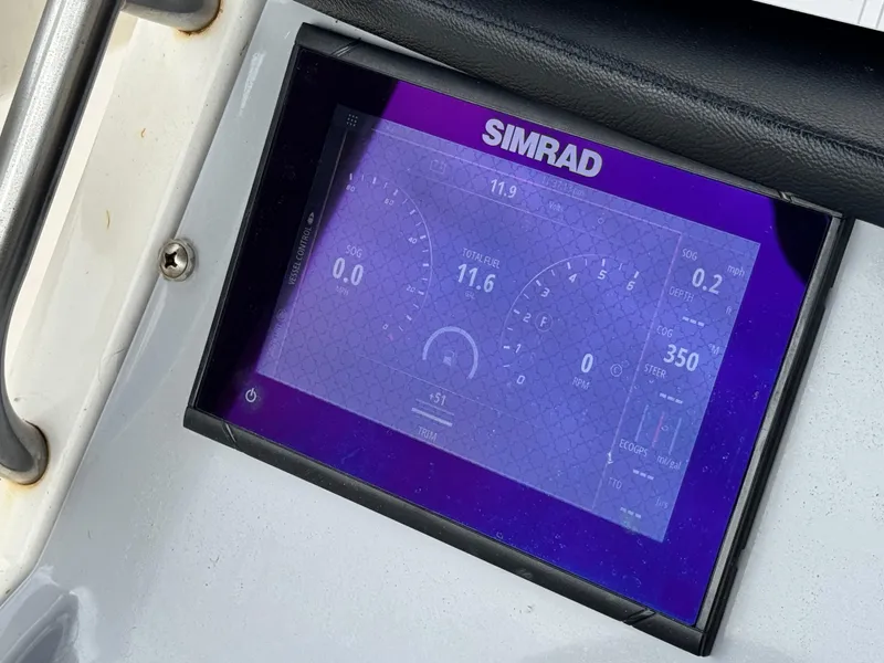 Slide: The Image of Simrad display on 2022 Bayliner Trophy T22CC boat dashboard. - 26