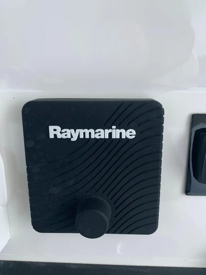 Slide: The Image of Raymarine control panel on 2019 Regulator 31 FS boat. - 23