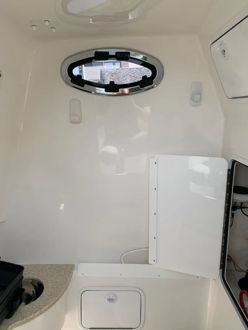 Slide: The Image of Interior cabin of 2019 Regulator 31 FS boat with storage compartments. - 36