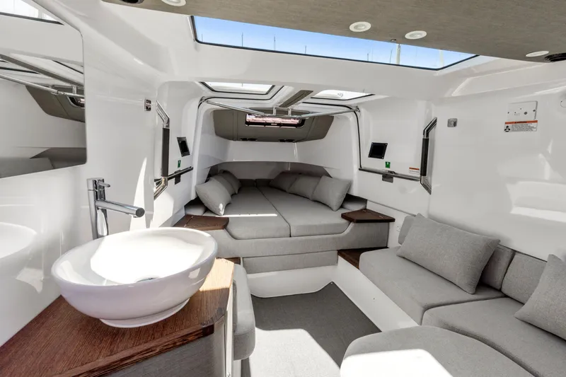 Slide: The Image of Luxurious interior of 2022 Axopar 37 Cross Cabin Brabus Trim with modern amenities. - 19