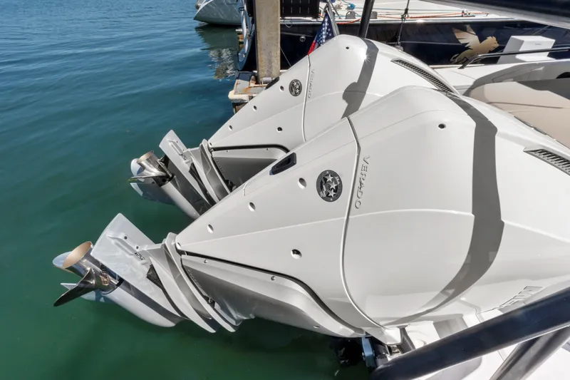 Slide: The Image of Twin outboard engines on 2022 Axopar 37 Cross Cabin Brabus Trim boat. - 25