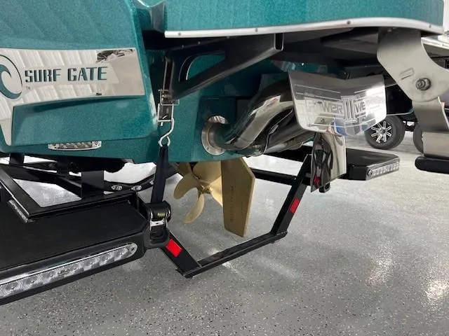 Slide: The Image of 2025 Malibu Wakesetter 24 MXZ boat with Surf Gate technology, rear view. - 8