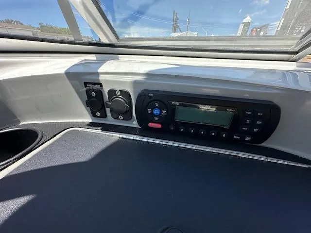 Slide: The Image of 2013 Bayliner 190 Bowrider dashboard with stereo system and controls. - 15