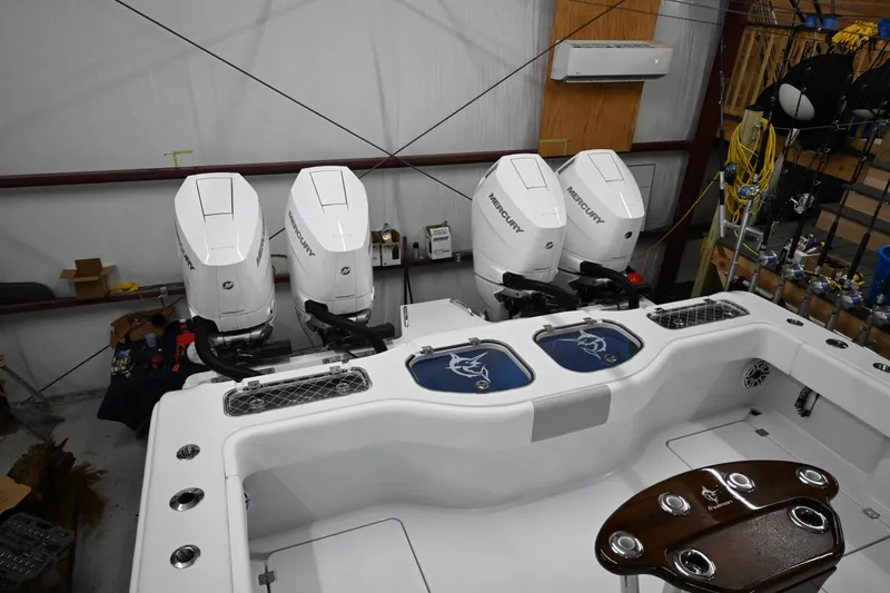 Slide: The Image of 2024 Freeman 43 boat on water, featuring sleek design and powerful engines. - 19