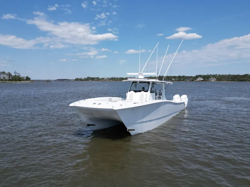 Slide: The Image of 2024 Freeman 43 boat interior with luxurious seating and ocean view. - 8