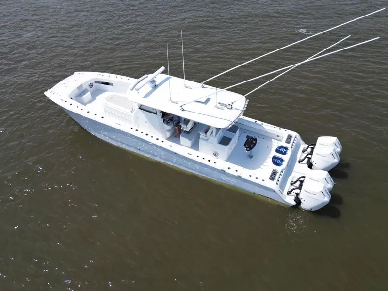 Slide: The Image of 2024 Freeman 43 boat interior with luxurious seating on open water. - 9