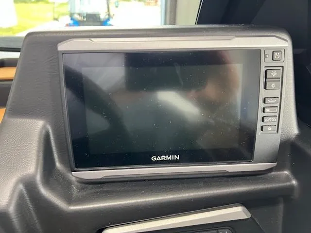Slide: The Image of Garmin display screen in 2024 Axis A225 vehicle dashboard. - 22