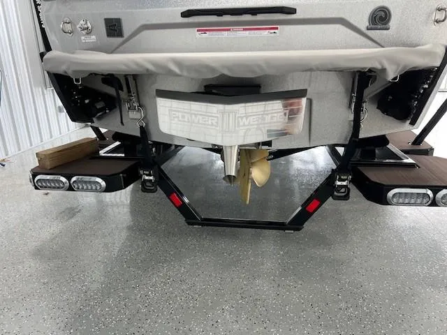 Slide: The Image of Rear view of 2024 Axis A225 boat with propeller and Power Wedge feature. - 6