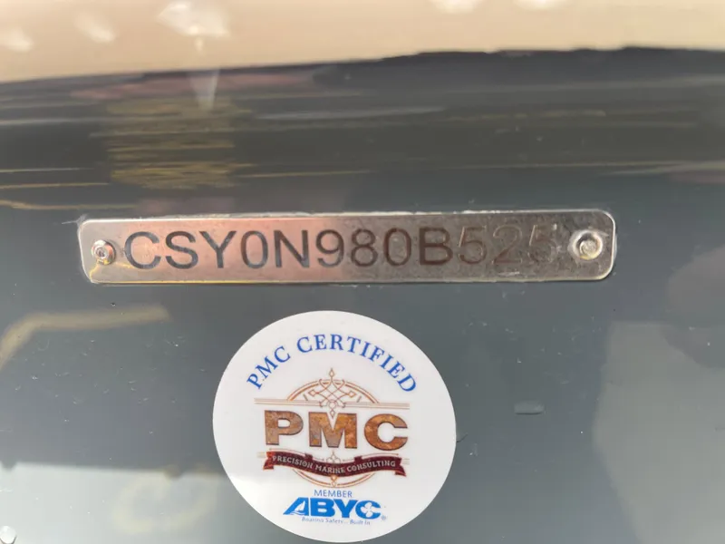 Slide: The Image of 2025 Carolina Skiff 21 Ultra Elite boat interior with seating and storage compartments. - 16