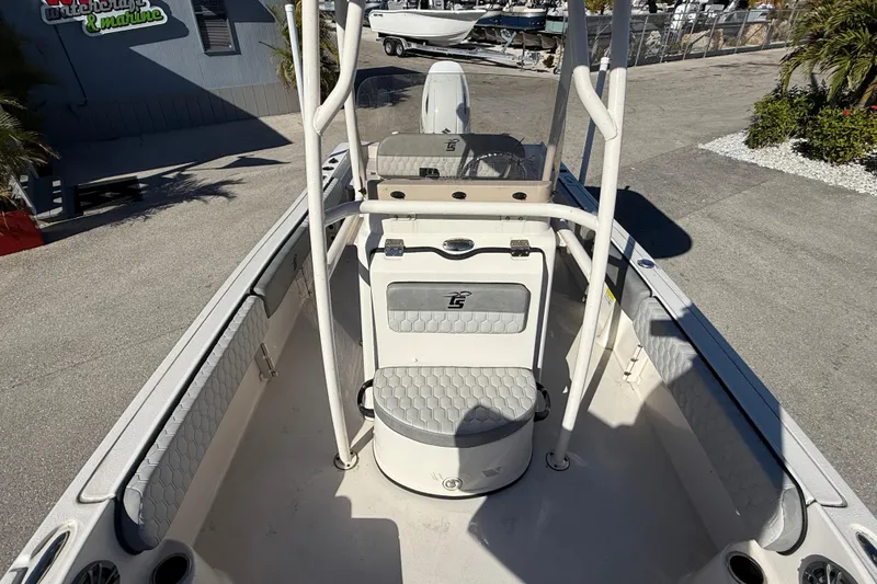 Slide: The Image of 2025 Carolina Skiff 21 Ultra Elite boat interior with seating and console. - 22