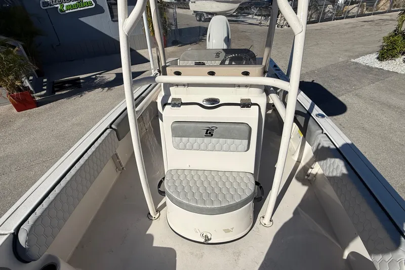 Slide: The Image of 2025 Carolina Skiff 21 Ultra Elite boat interior with seating and console. - 24