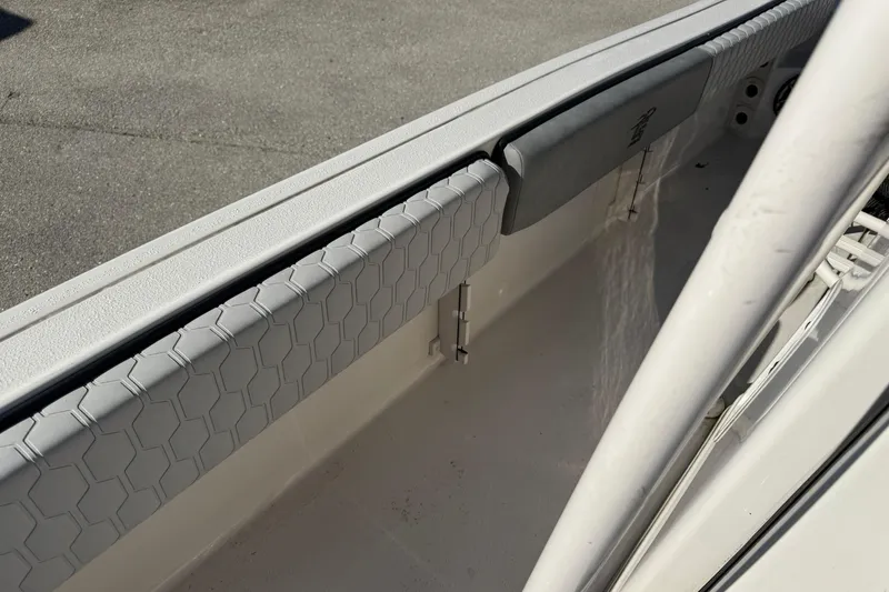 Slide: The Image of 2025 Carolina Skiff 21 Ultra Elite interior detail with textured padding and sleek design. - 26