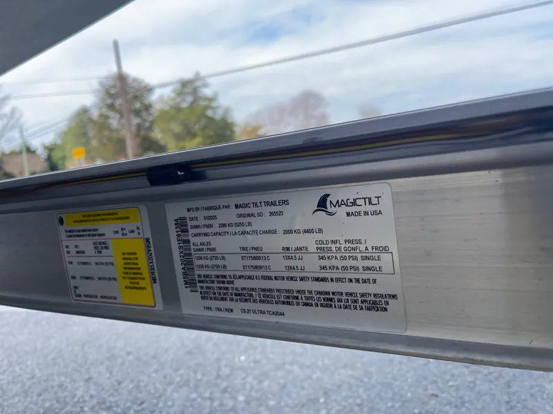 Slide: The Image of Label on Magic Tilt trailer for 2025 Carolina Skiff 21 Ultra Elite boat. - 29