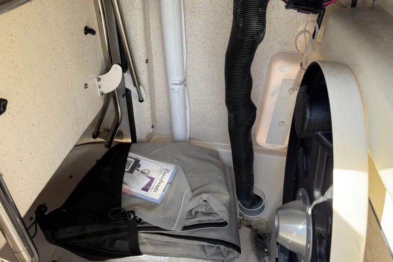 Slide: The Image of Interior view of 2025 Sea Chaser 22 HFC boat storage compartment. - 19