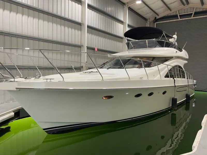 The Image of 2007 Ocean Alexander 54V yacht in indoor storage, side view. - 1