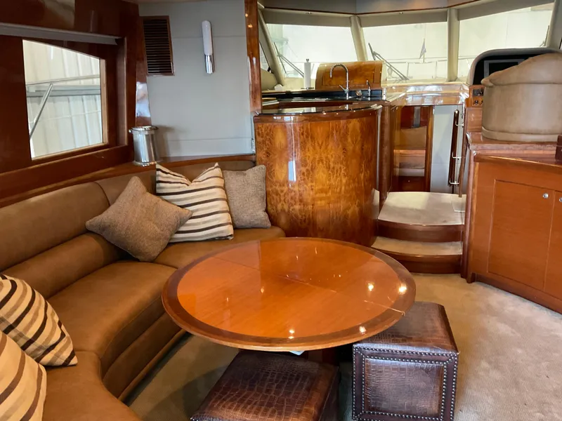 Slide: The Image of Luxurious interior of 2007 Ocean Alexander 54V yacht with elegant wood finishes and cozy seating. - 11