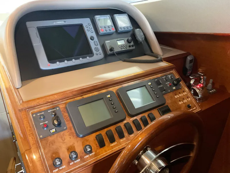 Slide: The Image of Control panel of a 2007 Ocean Alexander 54V yacht with navigation instruments. - 15