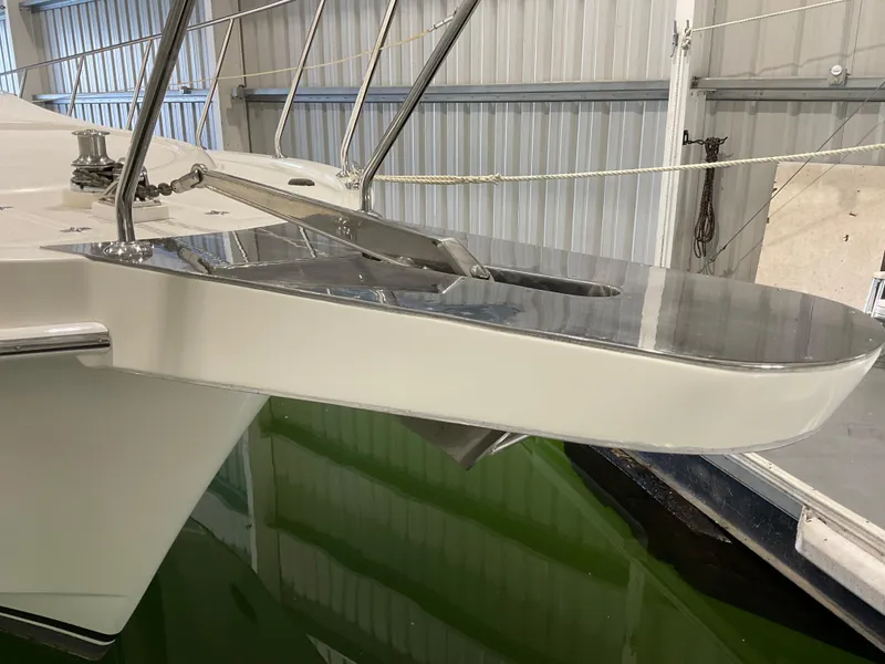 Slide: The Image of Bow of 2007 Ocean Alexander 54V yacht in a marina setting. - 4