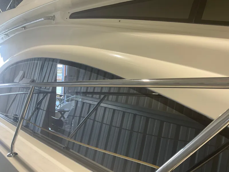 Slide: The Image of 2007 Ocean Alexander 54V yacht, sleek design with polished railings and modern windows. - 41