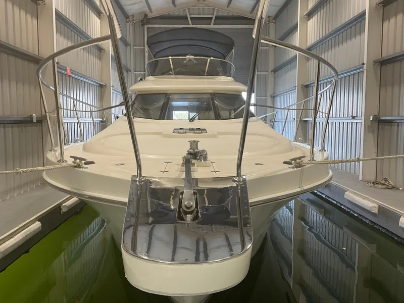 Slide: The Image of 2007 Ocean Alexander 54V yacht docked in a covered marina. - 5