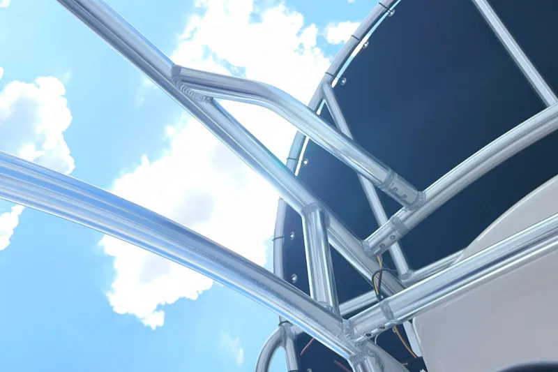 Slide: The Image of Aluminum framework of 2025 Carolina Skiff 21 LS against a bright blue sky. - 32