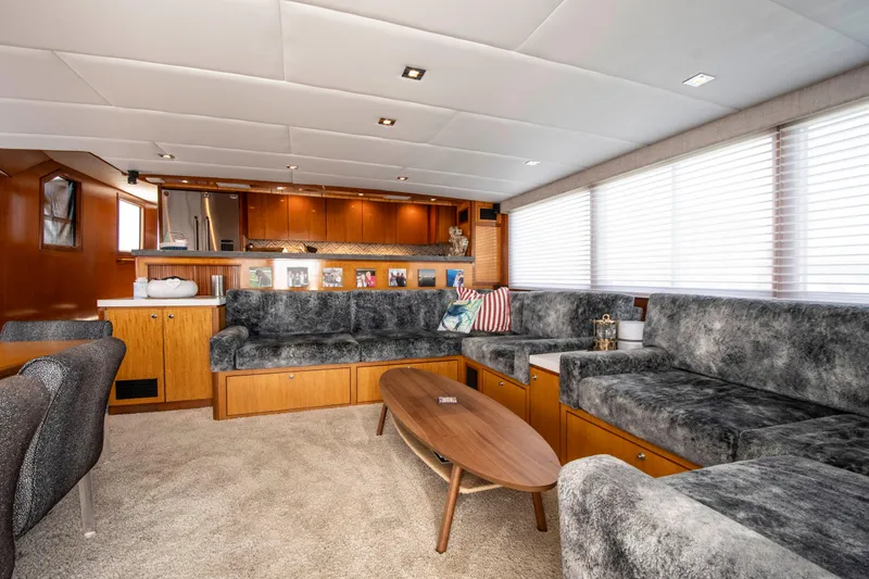 Slide: The Image of Luxurious 1988 Knight & Carver motoryacht interior with plush seating and modern decor. - 19