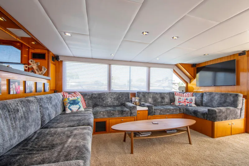 Slide: The Image of Luxurious 1988 Knight & Carver motoryacht interior with plush seating and modern decor. - 22