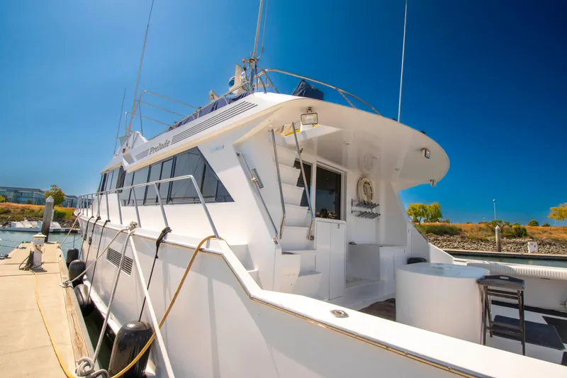 Slide: The Image of 1988 Knight & Carver Motoryacht docked under clear blue sky. - 3