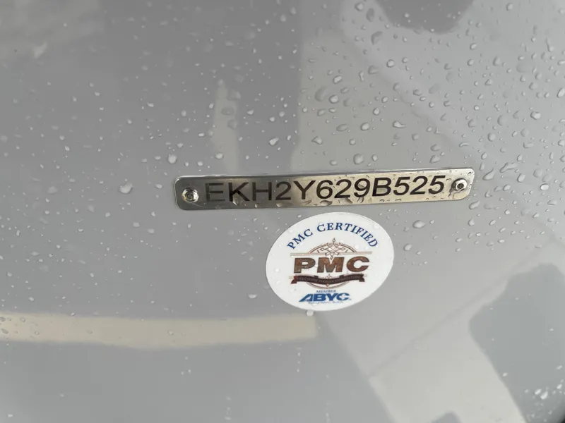 Slide: The Image of 2025 Carolina Skiff 21 LS with PMC certification and identification plate, wet surface. - 16