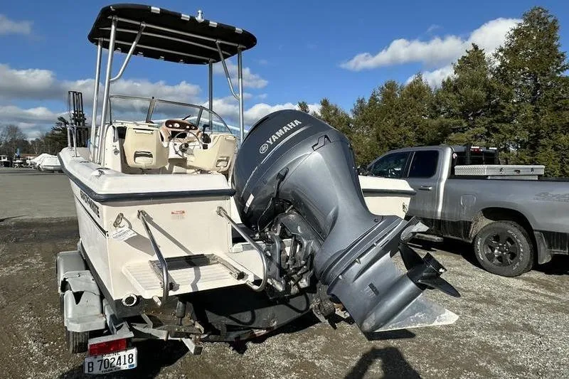 Slide: The Image of 1997 Grady-White Adventure 208 boat with Yamaha outboard motor on trailer. - 5
