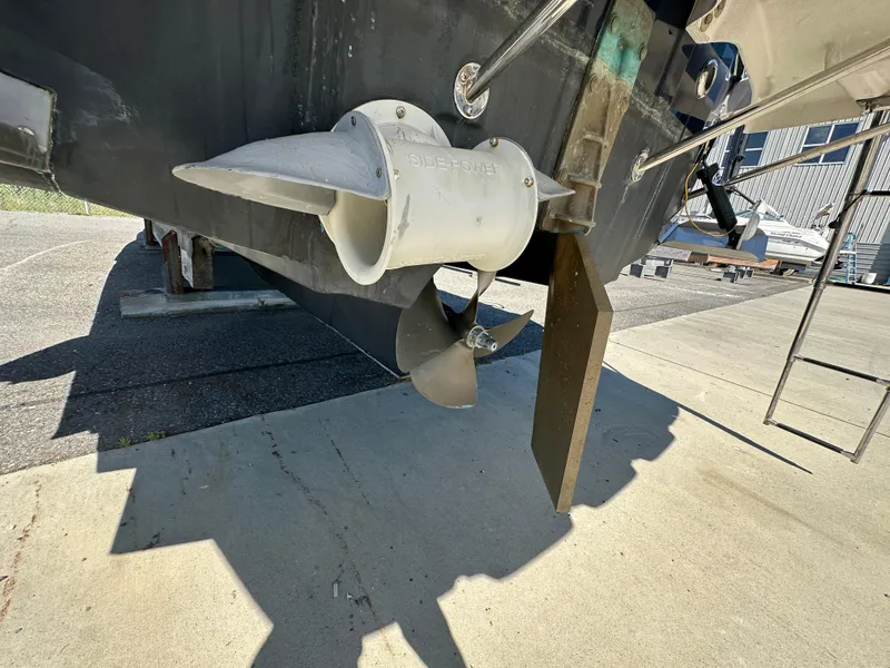 Slide: The Image of 2019 Cutwater C-28 boat propeller and rudder on dry dock. - 38