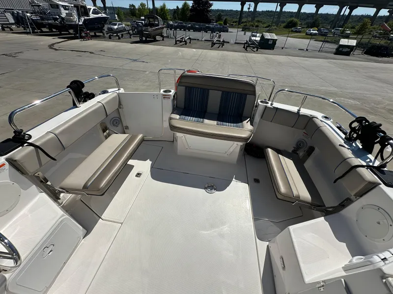 Slide: The Image of 2019 Cutwater C-28 boat interior with cushioned seating and open deck layout. - 5