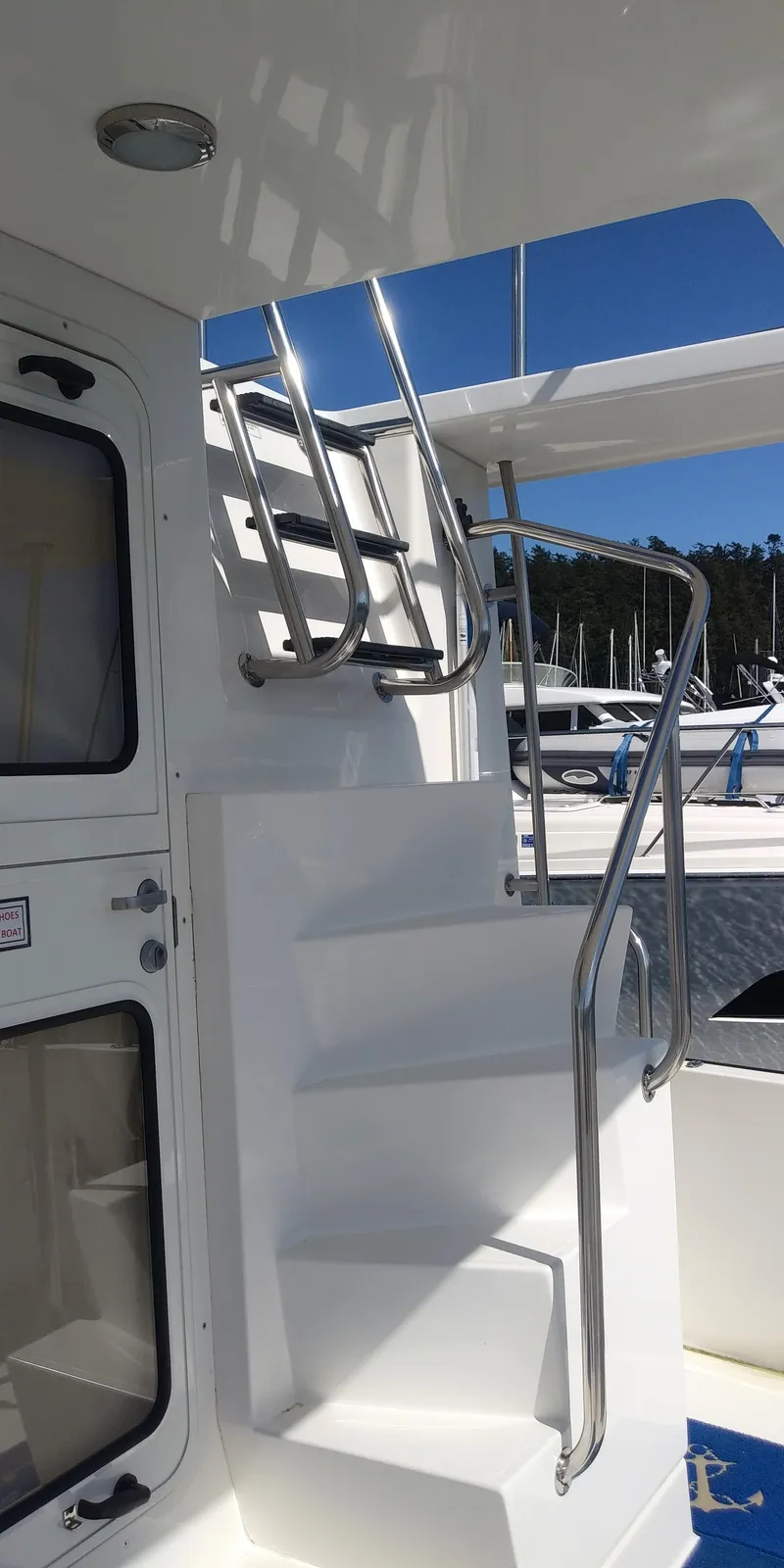Slide: The Image of Staircase on 2007 Nordic Tug 54 yacht with stainless steel railings. - 15