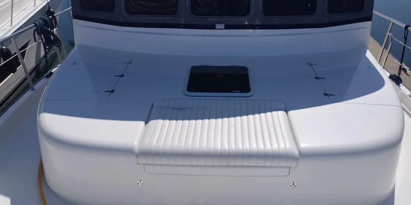 Slide: The Image of 2007 Nordic Tug 54 yacht deck with seating and hatch. - 20