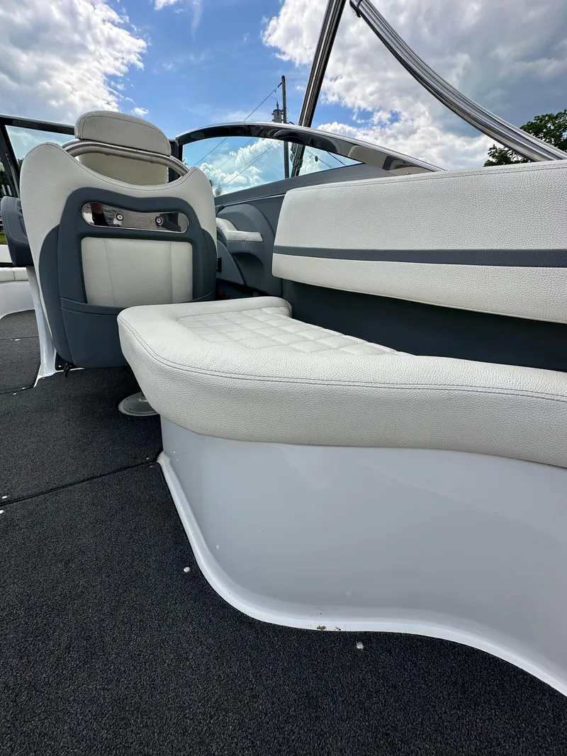 Slide: The Image of 2021 Cobalt R5 boat interior with white seating and sleek design. - 16