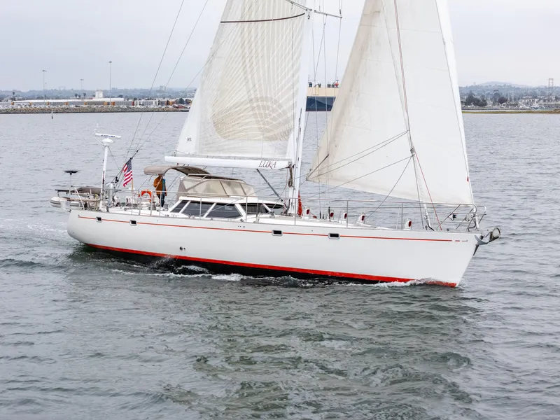 Slide: The Image of Sailing yacht Farr 60 Pilot House 1997 cruising on open water. - 13