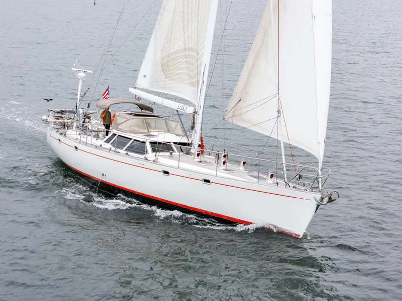 Slide: The Image of Sailing yacht Farr 60 Pilot House 1997 cruising on open water. - 14