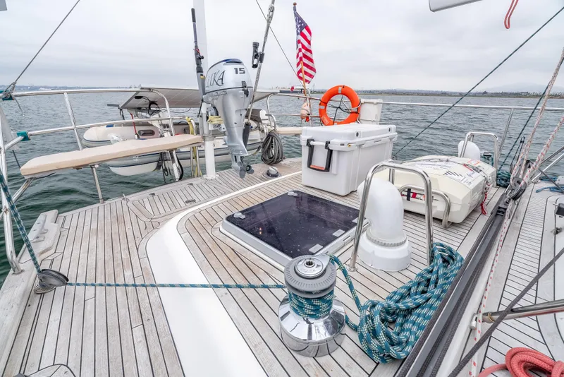 Slide: The Image of Deck of 1997 Farr 60 Pilot House yacht with equipment and American flag. - 23